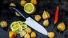 
                    Kyocera Santoku Keramikmesser zum Schneiden von Früchten