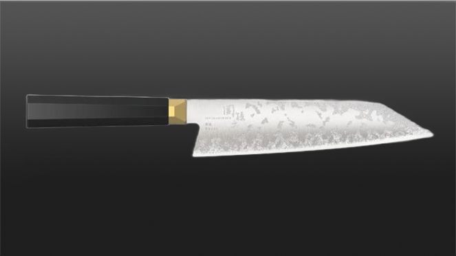 
                    Goldfarbenes Bolster des Ensei Kiritsuke: inspiriert vom „Habaki“, dem Metallkragen am Übergang von Griff zu Klinge beim Samurai-Schwert