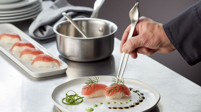 
                    Side of the decorative tweezers ensures precise placement of herbs