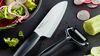 
                    Kyocera Santoku Keramikmesser mit Sparschäler